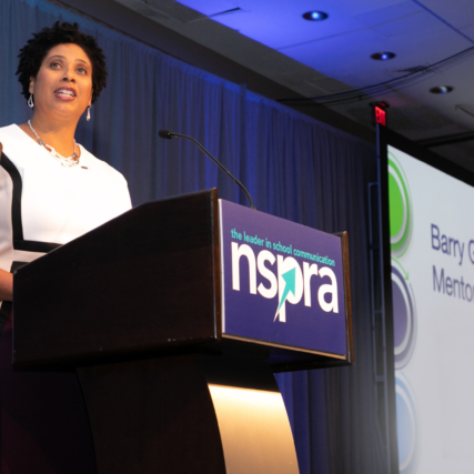 Lesley Bruinton at the NSPRA podium.