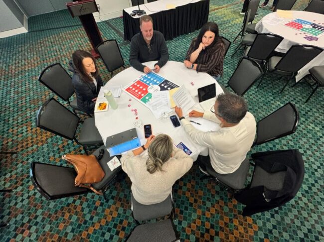 Participants play The Crisis Zone game.